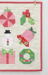 Holly Jolly Mini Christmas Sampler Quilt - A pattern by Nadra Ridgeway of ellis & higgs