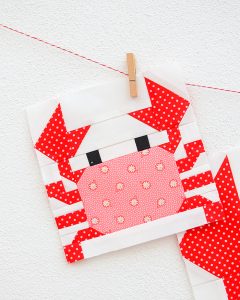 6 Inch Crab quilt block hanging on a wall