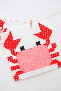 12 Inch Crab quilt block hanging on a wall