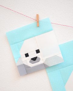 6 Inch Seal Pup quilt block hanging on a wall