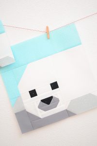 12 Inch Seal Pup quilt block hanging on a wall