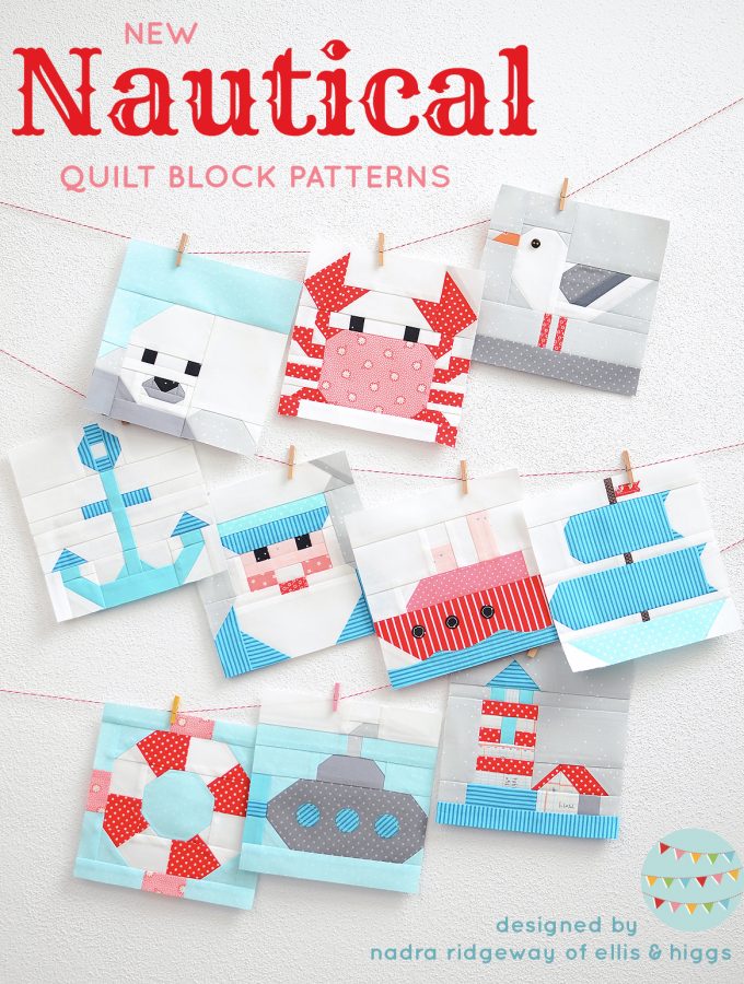 Ten nautical quilt blocks hanging on the wall.