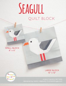 Seagull quilt block in two sizes hanging on a wall