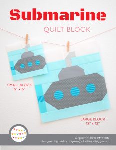 Submarine quilt block in two sizes hanging on a wall