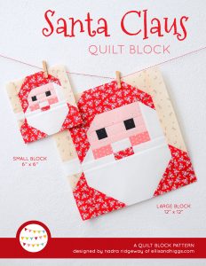 Santa Claus quilt block in two sizes hanging on a wall