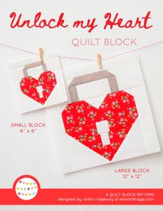Padlock Heart quilt block in two sizes hanging on a wall