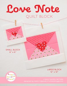 Love Letter quilt block in two sizes hanging on a wall