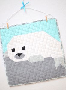 Seal Pup mini quilt on a wallhanger