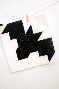 12 Inch Bat quilt block hanging on a wall