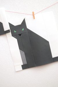 12 Inch Cat quilt block hanging on a wall