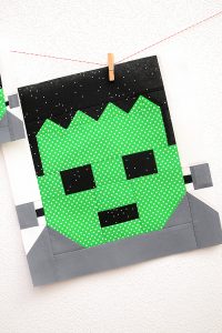 12 Inch Frankenstein quilt block hanging on a wall