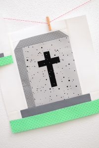 12 Inch Gravestone quilt block hanging on a wall