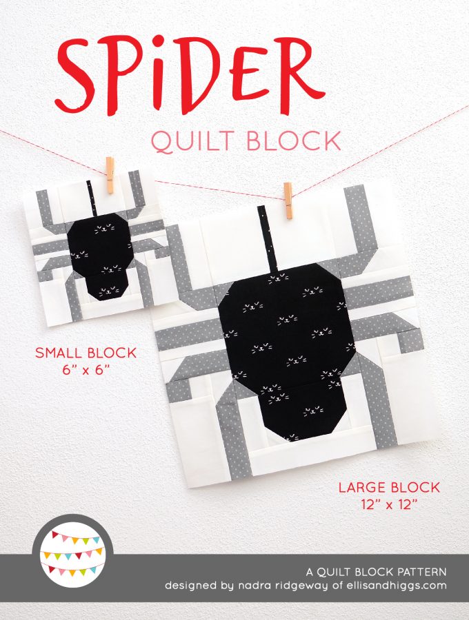 Spider quilt block in two sizes hanging on a wall