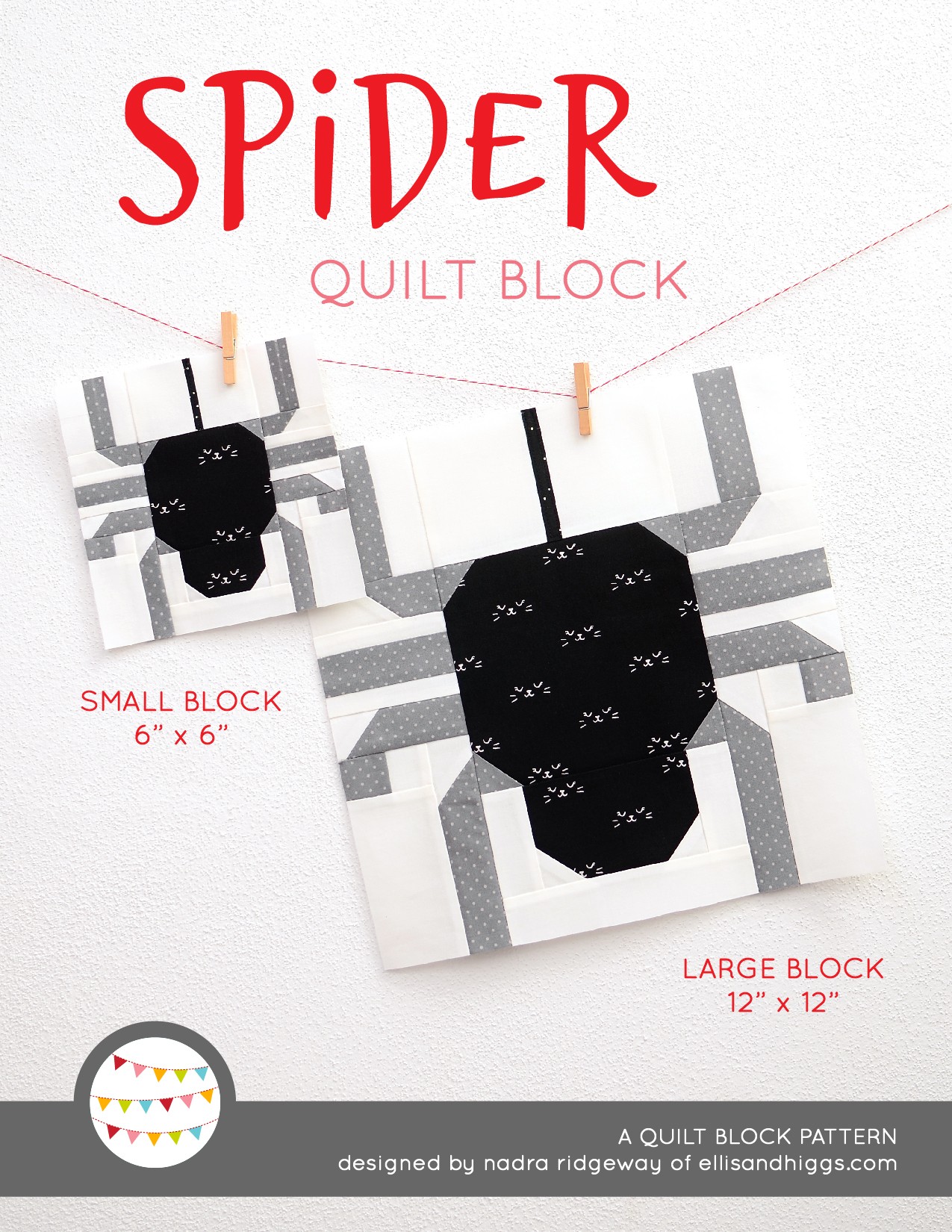 Spider quilt block in two sizes hanging on a wall