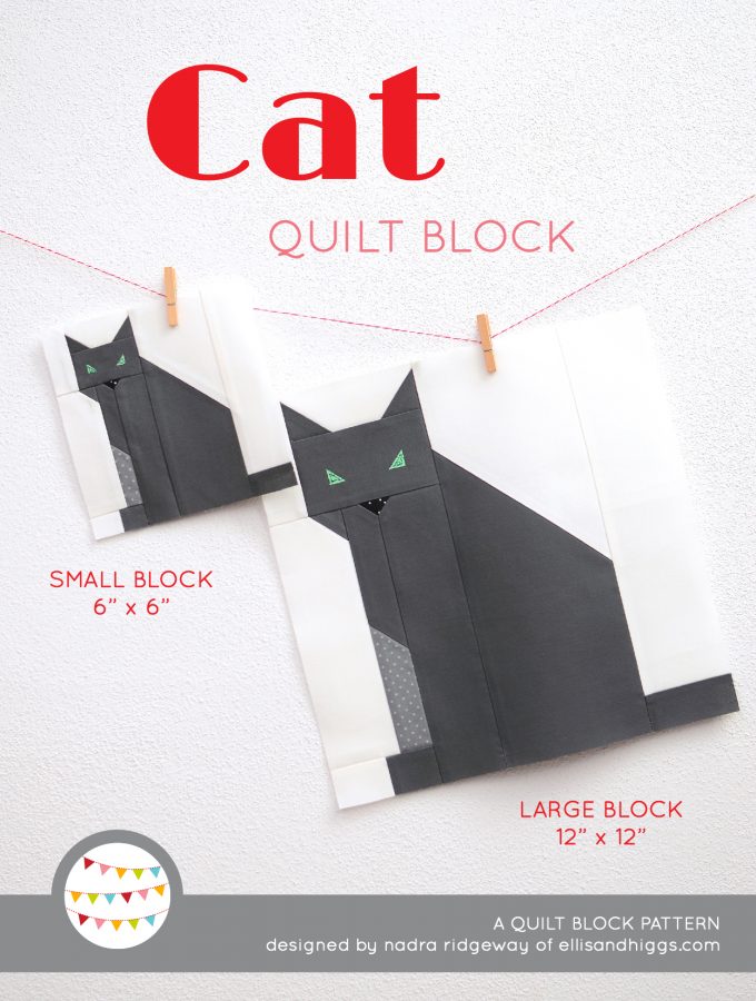 Cat quilt block in two sizes hanging on a wall