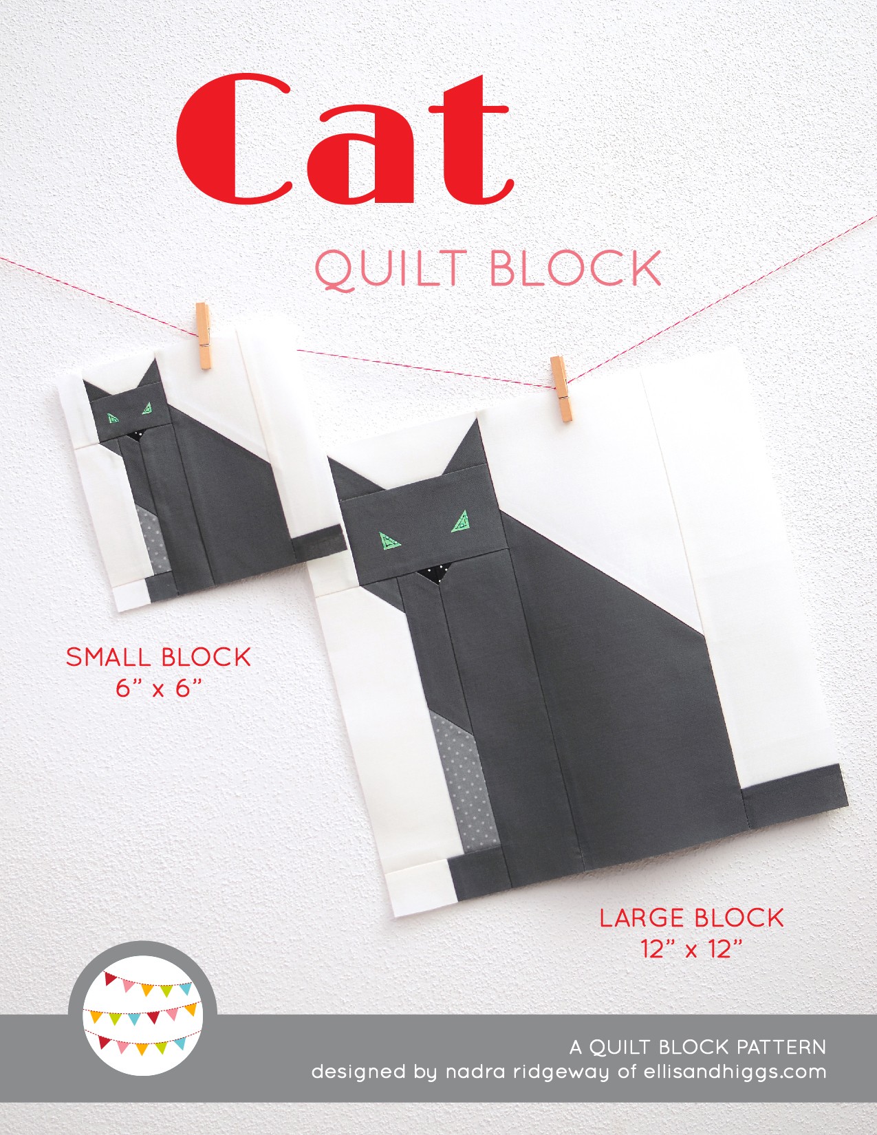 Cat quilt block in two sizes hanging on a wall
