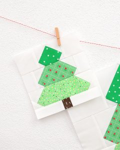 6 Inch Christmas Tree quilt block hanging on a wall