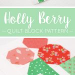 Holly Berry quilt block in two sizes hanging on a wall - Christmas quilt pattern