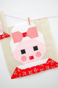 12 Inch Mrs Santa Claus quilt block hanging on a wall