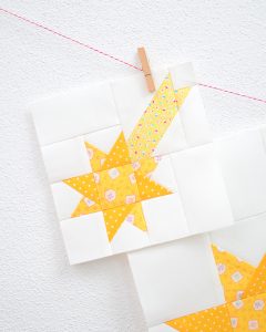 6 Inch Star quilt block hanging on a wall