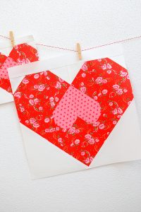 12 Inch Heart quilt block hanging on a wall