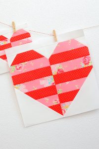 12 Inch Heart quilt block hanging on a wall