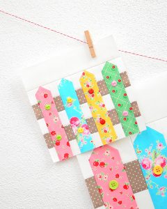 6 Inch Fence quilt block hanging on a wall