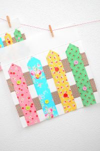 12 Inch Fence quilt block hanging on a wall
