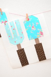 12 Inch Fork & Trowel quilt block hanging on a wall