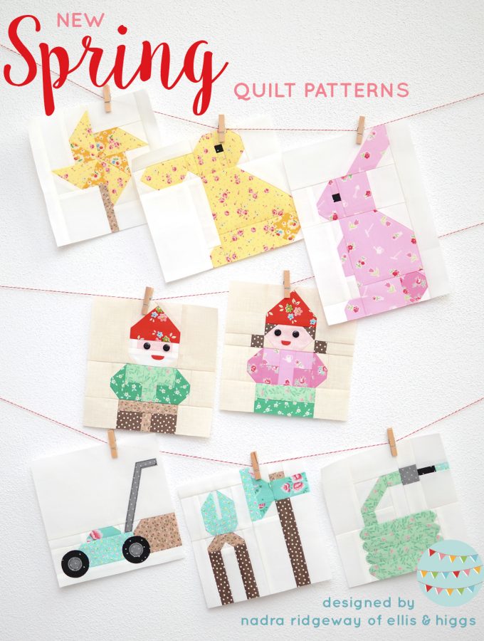 Spring quilt blocks hanging on the wall